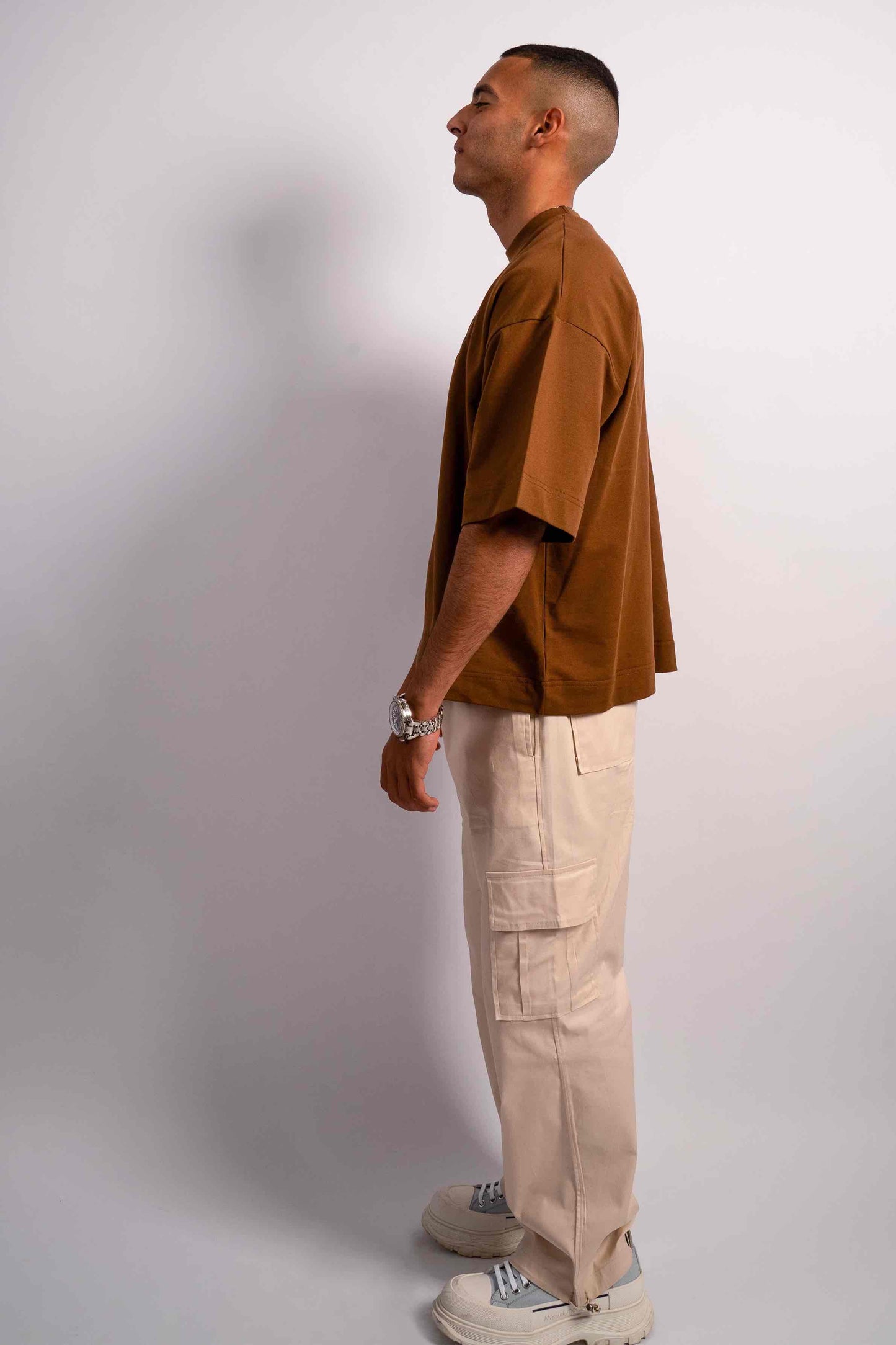 elegantly embroidered, but Brown