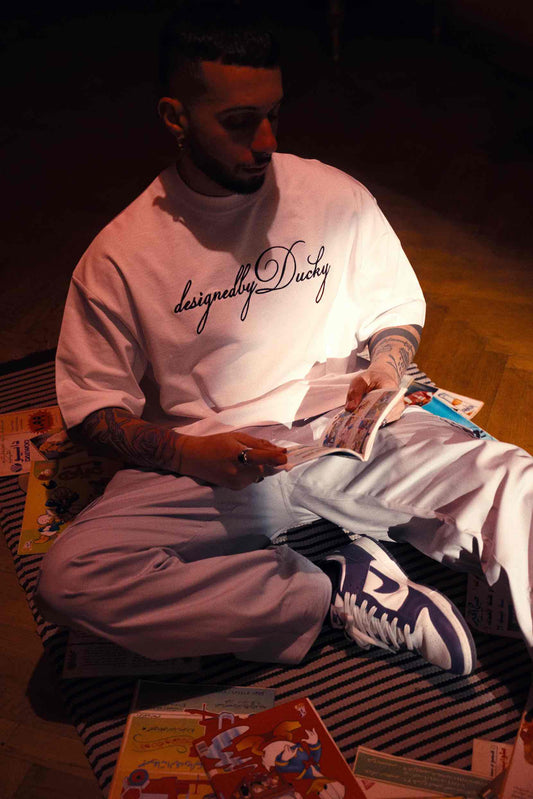 elegantly embroidered, but White