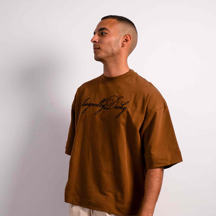 elegantly embroidered, but Brown